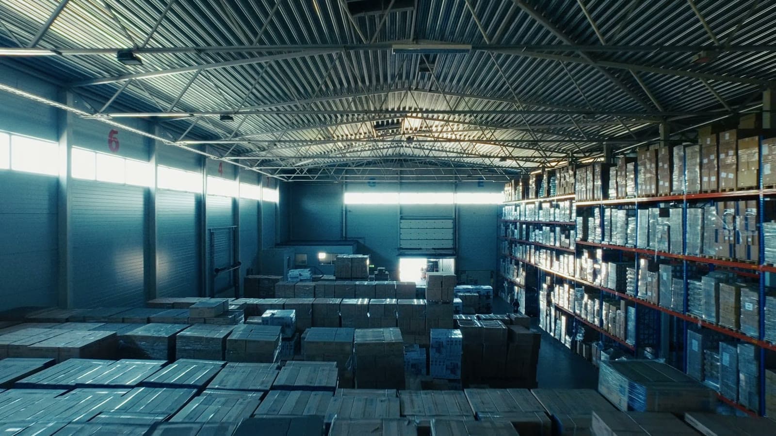Pallets of goods stacked in a distribution warehouse